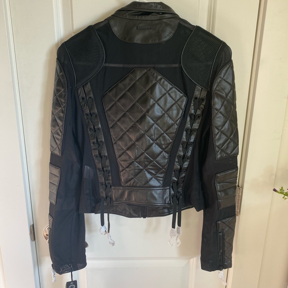 Genuine black leather coat from Blanc Noir. Size small. New with tags!